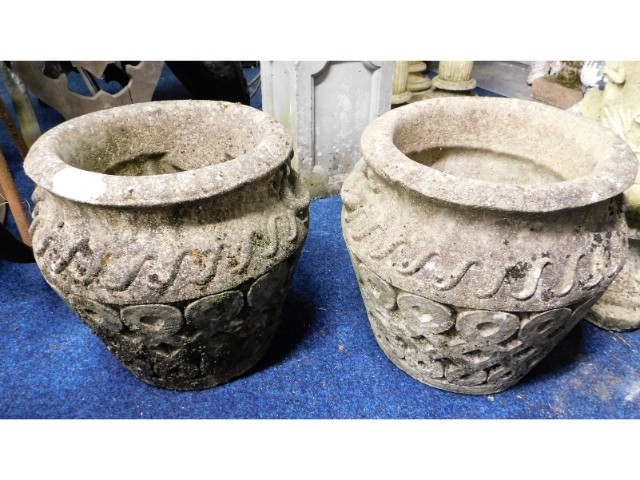 A pair of reconstituted stone planters, 15.25in ta