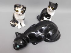 A pair of Winstanley pottery cats twinned with one