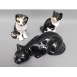 A pair of Winstanley pottery cats twinned with one