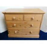 A low level pine chest with four drawers, 33.75in