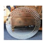 A circular mirror with mosaic style outer edge, 25