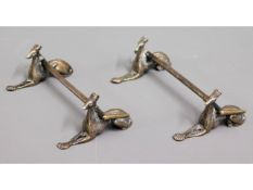 A pair of antique silver plated hunting related kn