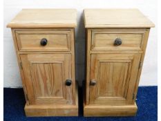 A matching pair of pine bedside cabinets 26.5in hi