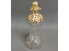 An 1895 Victorian silver topped waisted decanter,