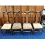 Four antique rush seated dining chairs, 40.75in hi