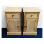 A matching pair of pine bedside cabinets, 26.5in h