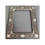 A mother of pearl inlaid Islamic frame, 13in x 7in