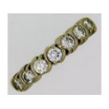 An 18ct yellow gold half eternity ring set with ap