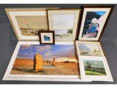 A selection of framed pictures including a Peter T