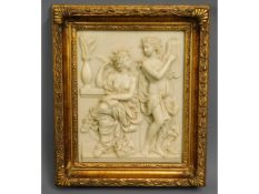 A gilt framed reproduction resin plaque, 13in high