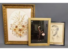 A framed picture of pressed flowers by Janet Jay,