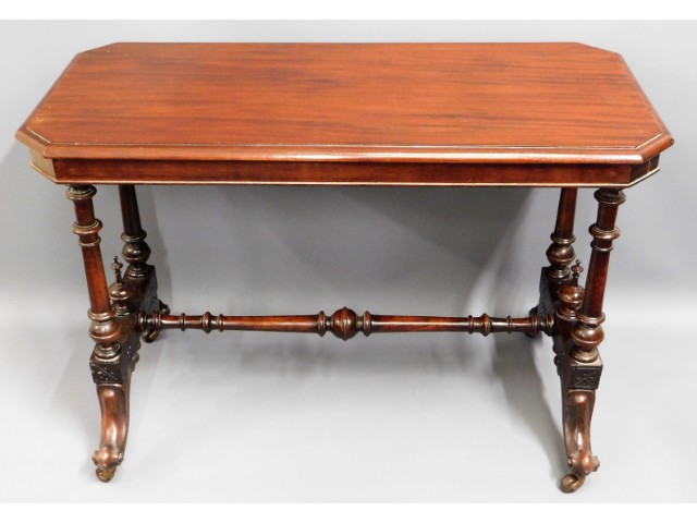 A 19thC. mahogany hall table with ornate supports on glass feet, 42in wide x 20in wide x 29in high £