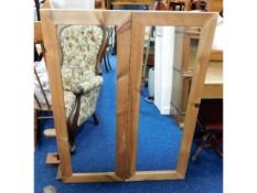 A pair of pine framed mirrors, 44.5in tall x 17in