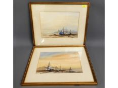 A pair of framed watercolours of yachts moored, in
