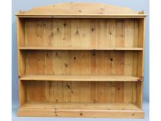 A large pine bookcase, 59.5in wide x 54.5in high x 11.875in deep £60-80