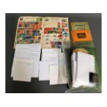 A quantity of mixed stamps off paper in envelopes, a child's stamp album & related items & two antiq