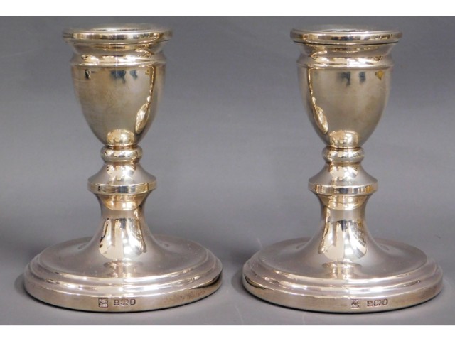 A pair of silver candlesticks, 277g loaded, 4in hi