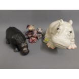 Two ceramic models of hippo's, one with faults, tw