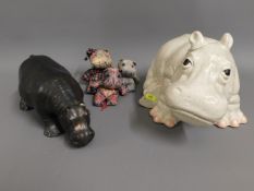 Two ceramic models of hippo's, one with faults, tw