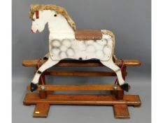 A small child's rocking horse, 32in long x 27.5in