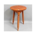 A bobbin legged Gypsy table, 28.75in high x 19.75in diameter £30-50