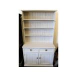 An antique pine dresser, later painted, 43.5in wid