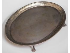 An antique silver (tested) footed tray with claw f