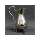 A Mappin & Webb silver cream jug, 208.9g. 5.5in ta
