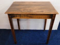 A stained oak table, 30in wide x 21.5in deep x 30.