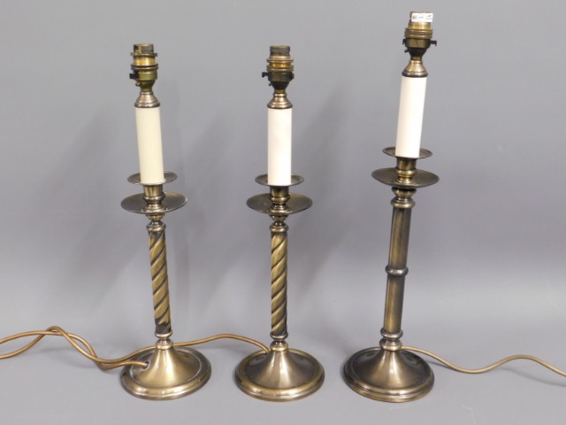Three modern "candlestick" lamps