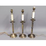Three modern "candlestick" lamps