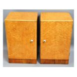 A pair of birds eye maple bedside cabinets with rosewood veneer to base, 24in high