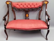 An inlaid Regency style upholstered three piece be