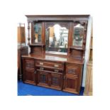 A large Victorian mahogany mirrored dresser set with cupboards & drawers, 82in high x 71.25in wide x