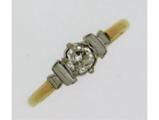 An art deco diamond solitaire set with old cut sto