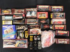 A quantity of vintage Scalextric toy cars & relate