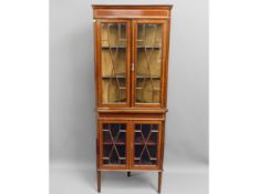 A c.1900 Regency style mahogany corner cabinet, 68