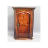 A small George III oak corner cabinet with inlaid with image of Britannia, 26in high x 18in wide x 1