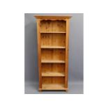 A large pine bookcase, 36.625in wide x 73.25in high x 12.875in deep £60-80