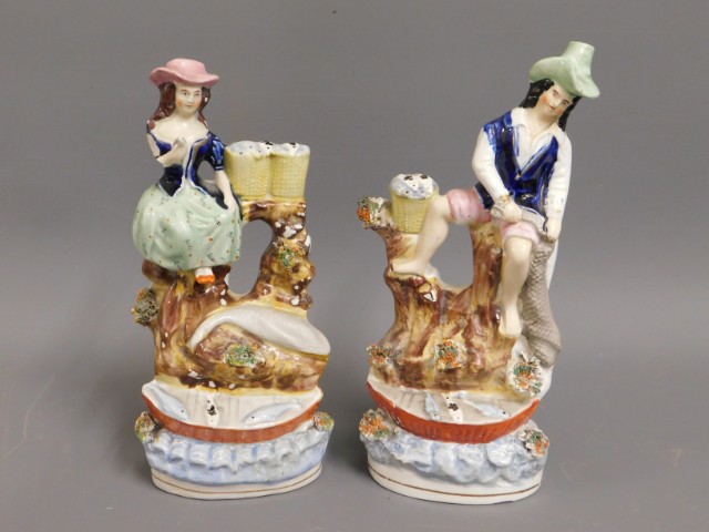 A pair of 19thC. Staffordshire figures a/f, 9in ta