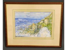 A framed watercolour of Cornish coastal mine scene