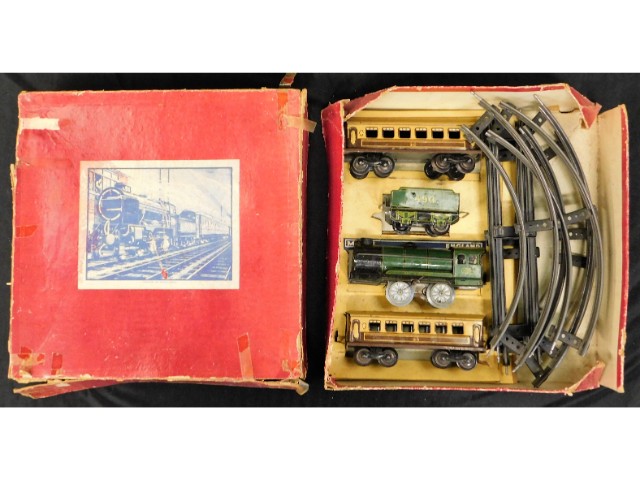 An English tin plate clockwork train set, one carr