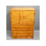 A vintage birds eye maple cabinet with two drawers & shelved cupboard over, small area of minor old