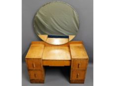 A vintage birds eye maple dressing table with five drawers & round mirror over & rosewood veneer to