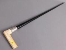 A ivory topped ebonised cane with silver collar, 3