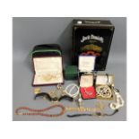 A quantity of costume items & a Jack Daniels tin