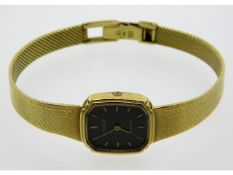 A ladies 9ct gold Tissot quartz wristwatch, 23.9g