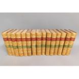 Fifteen volumes of Charles Dickens books published