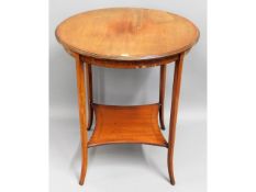 An Edwardian mahogany table, 28in high x 24in diameter