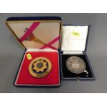 A sterling silver medal (116.1g) presented at the